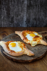 Khachapuri with cheese. Side view.
