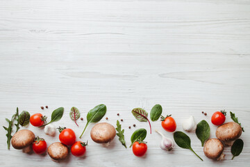 Frame made of of fresh vegetables on white