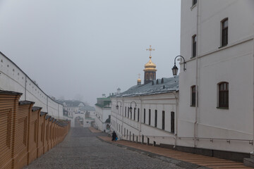 Kiev Pechersk Lavra monastery in Kiev, Ukraine. Orthodox church in the morning fog