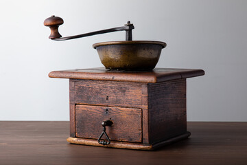 Vintage manual hand coffee grinder for grinding coffee beans.