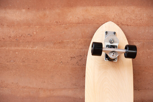 Surf Skate Board On Wall Background