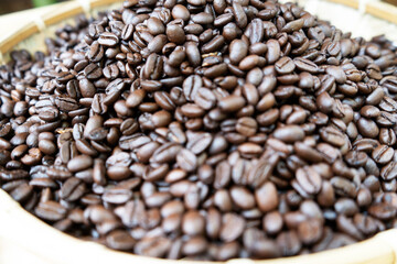 Coffee beans closeup on blurred background