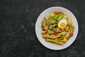 Rice noodles with chicken green curry Thai cuisine