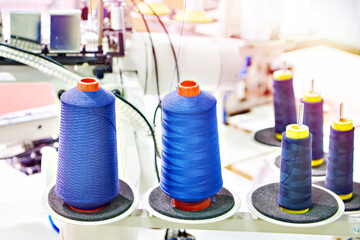 Spools of thread and sewing machine