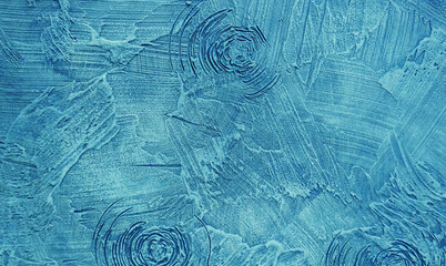 Decorative putty sample on the wall. Home repairs. Selective focus.
