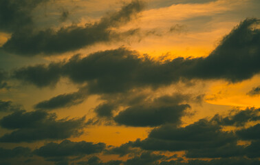 The sky during the sunset is beautiful, exotic with yellow and orange blends together at Phayun Beach, Ban Chang, Rayong.
