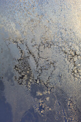 Frosty drawings on window glass