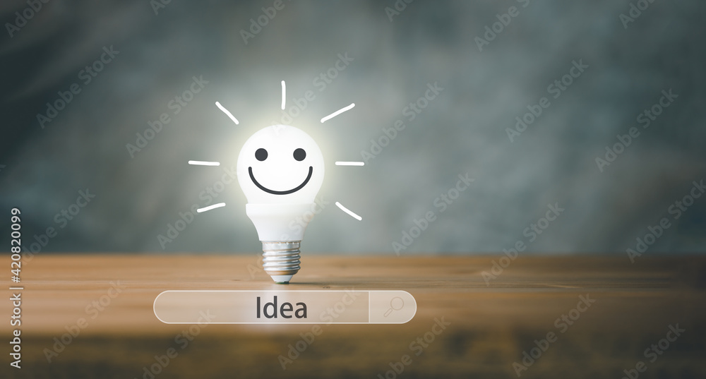 Fototapete Lightbulb smile face and search bar with creative idea Concept. Searching of idea and innovation
