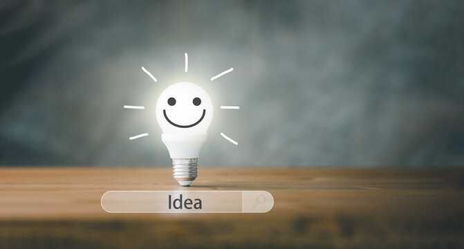 Lightbulb smile face and search bar with creative idea Concept. Searching of idea and innovation