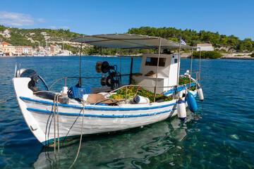 Fototapeta na wymiar Local fishing boat in Gaios harbour, Paxos, Greece