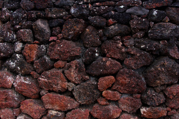 Closeup on red stone wall 