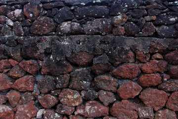 Closeup on red stone wall 