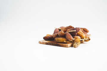 close up of dates with white background
