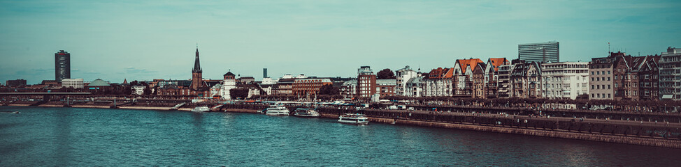 Fototapeta na wymiar Beautiful shore of Rhine river in Dusseldorf . Germany