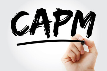 CAPM - Capital Asset Pricing Model acronym with marker, business concept background