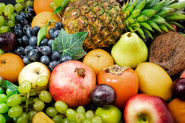 Naklejka na ściany i meble Assortment of colorful ripe tropical fruits. Top view