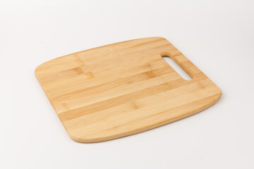 Top view high quality wood cutting board, brown wood. Chopping boards made from natural bamboo. Isolated image kitchen utensil on white background.