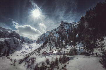 Malaiesti chalet in winter. Beautiful view of Malaesti valley in Bucegi mountains, Carpathians Alps, Romania