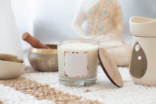 meditation space with candles and woman in background