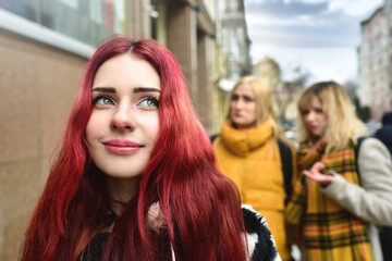 Self-confident teenage girl ignores jealous people who spread gossip behind her back. stop...