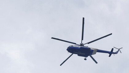 Fototapeta na wymiar Police helicopter monitoring the situation