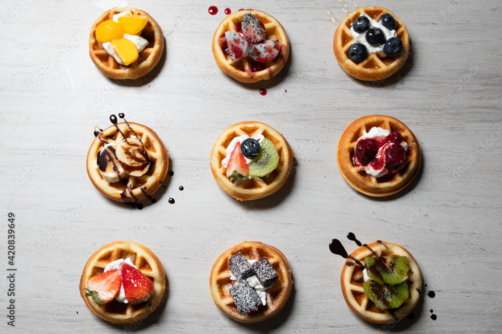 Wall mural cafe - mini waffles with cream and fruit topping