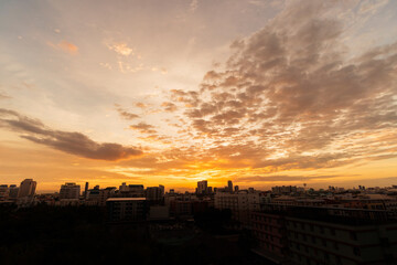 Golden light of the sunset over the city.