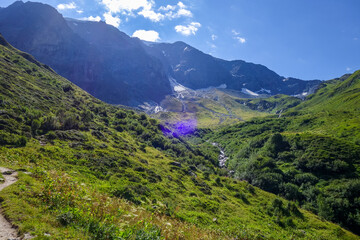 Alpine glaciers and mountains landscape in French alps.