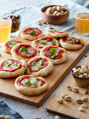 small tomato and cheese pizza appetizer with beer 