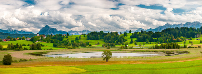 beautiful panoramic landscape in Bavaria, Germany, with alps mountain range