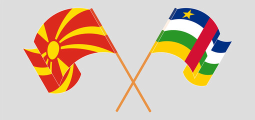 Crossed and waving flags of North Macedonia and Central African Republic