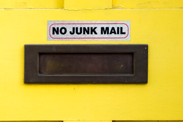 House letterbox with 'No junk mail' sign