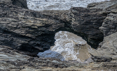 Vendée, France; March 14, 2021: Photo of the Devil's Hole seen from above, a sea cave on the Corniche de Rié, in the town of Saint-Hilaire-de-Riez.

