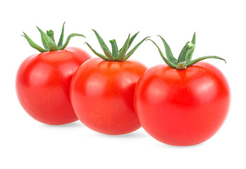 Three ripe red tomatoes isolated on a white background. Cherry tomatoes.