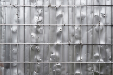 silver metal fence use as background or texture