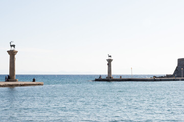 Deer statues welcoming to Rhodes harbor, Rhodes Town, Dodecanese, Greece