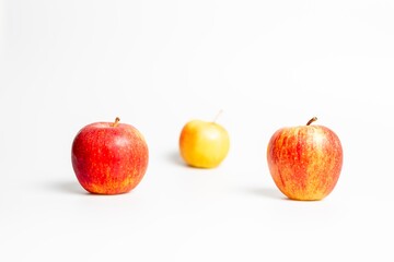 Red apples on a white background