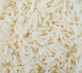 Closeup of cooked white rice. Food backdrop