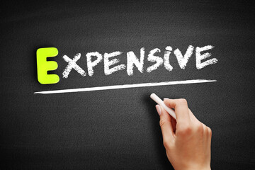 Fototapeta premium Expensive text on blackboard, concept background