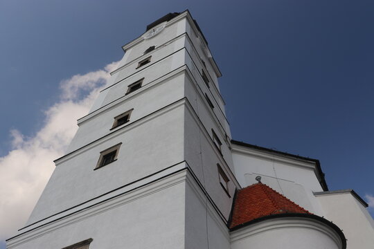 A view to the tower of white church in Branna, Czech republic