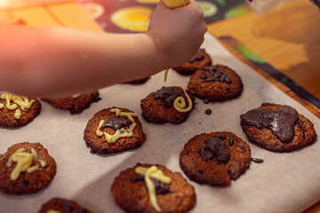 applying the glaze to homemade cookies