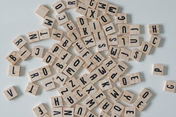 Wooden letters on a white back ground.