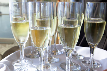 glasses of champagne on a tray ready to be served for toast