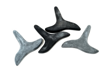 Jade guasha for spa treatments, massage stone on white background.Isolated.Chinese traditional massage - Gua Sha with stone.Jade massage scraper, gemstone .