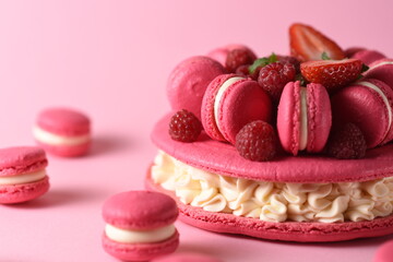 macarons - legend of French cuisine on a pink background. an exquisite dessert with a refined taste.