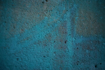 Obraz premium Green blue colored wall seen close up