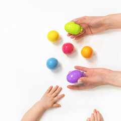 baby learns the colors of the house with his mother, top view