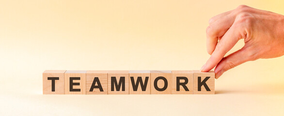 woman made word teamwork with wood blocks