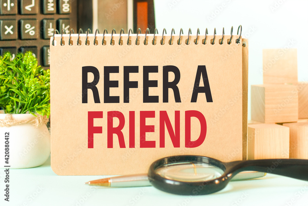 Aufkleber craft colour notepad with text refer a friend. notepad with calculator, wooden blocks, magnifying gl