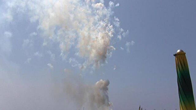 Pyrotechnics saw from the beach to celebrate Our Lady of Mount Carmel day, Marina di Camerota, Italy.